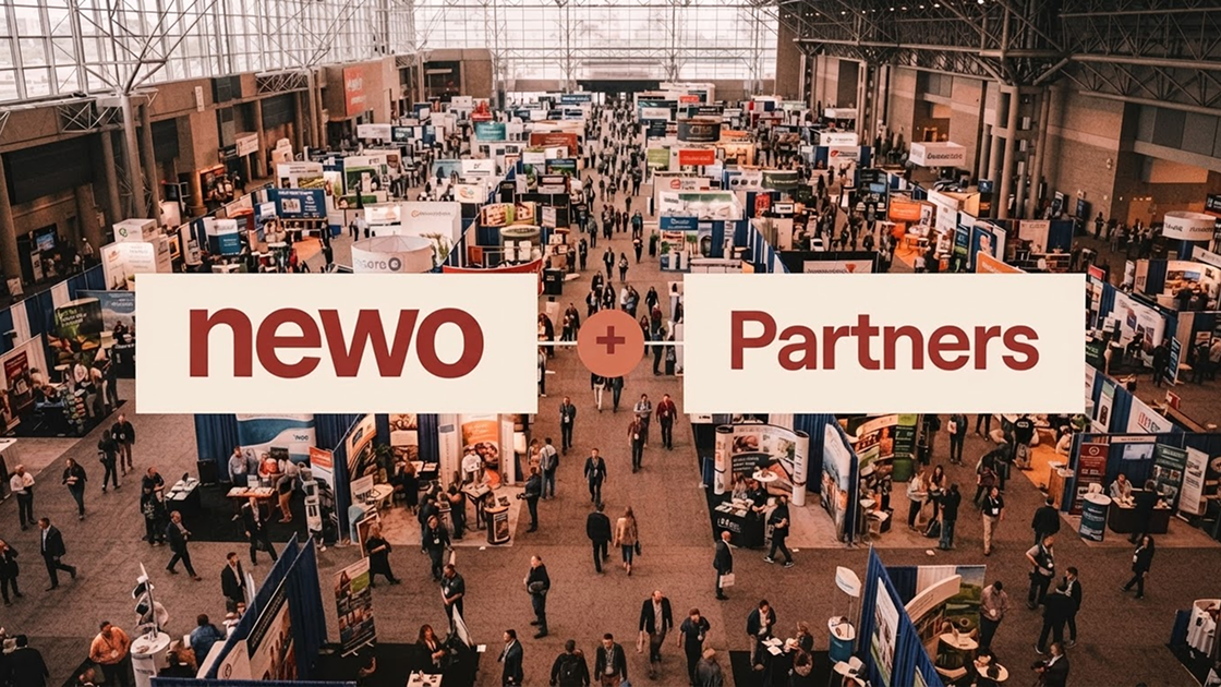 Newo + Partners branding over a busy tradeshow exhibition hall